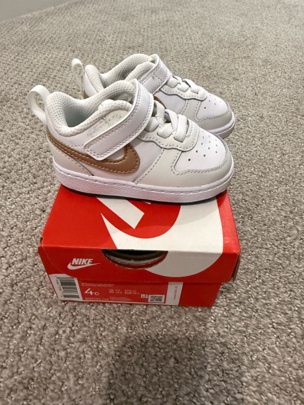Nike Toddler White Sneakers with Metallic Bronze Swoosh